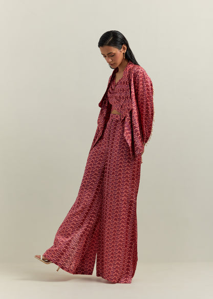 woman wearing peach handcrafted block printed co ord set in cotton satin