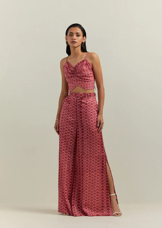 woman wearing peach handcrafted block printed co ord set in cotton satin 